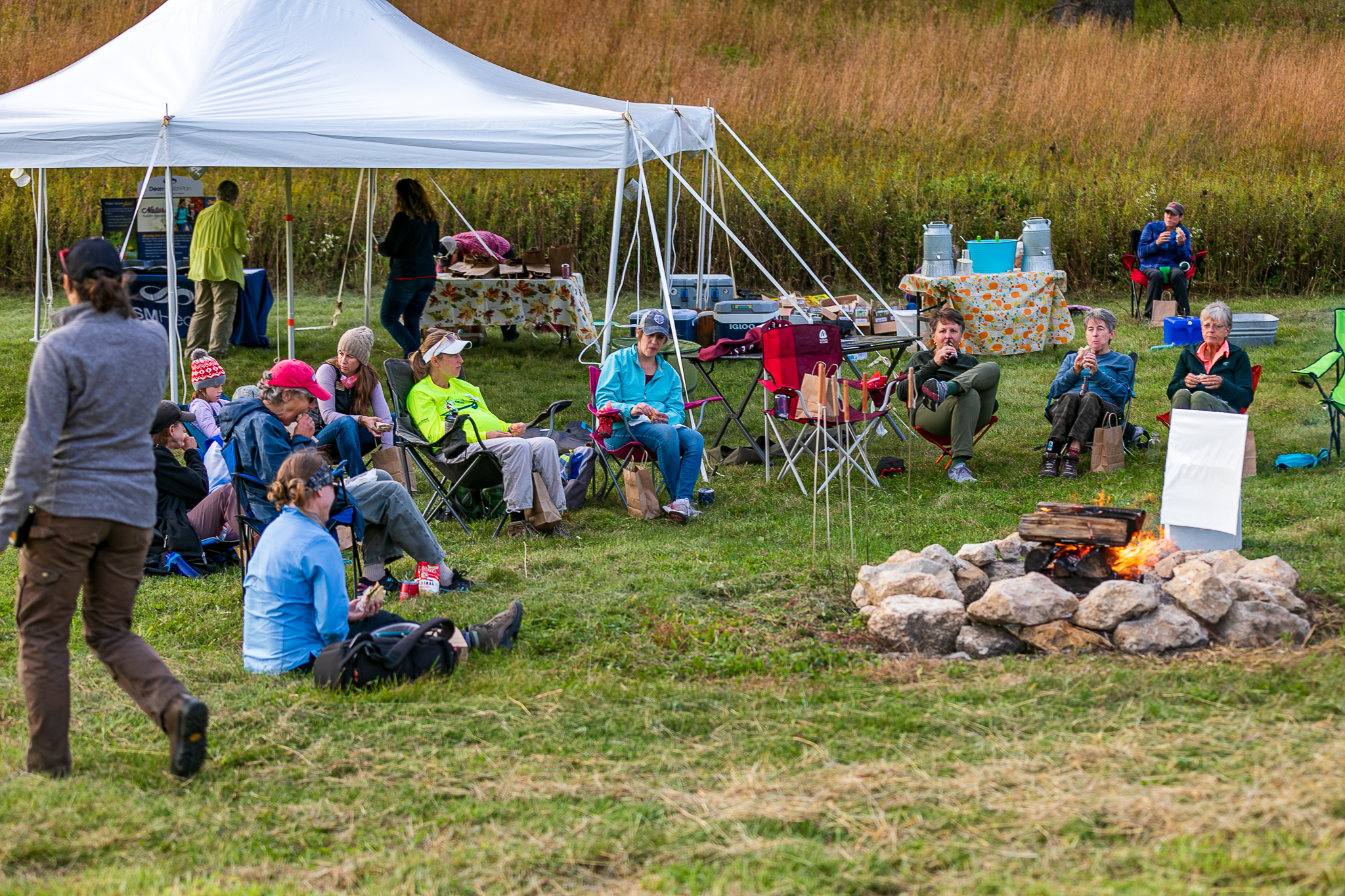 Volunteers enjoy a celebratory bonfire at Trailtessa event.