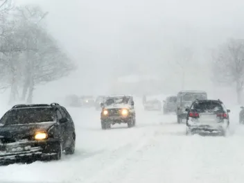 Cars driving in a snowstorm