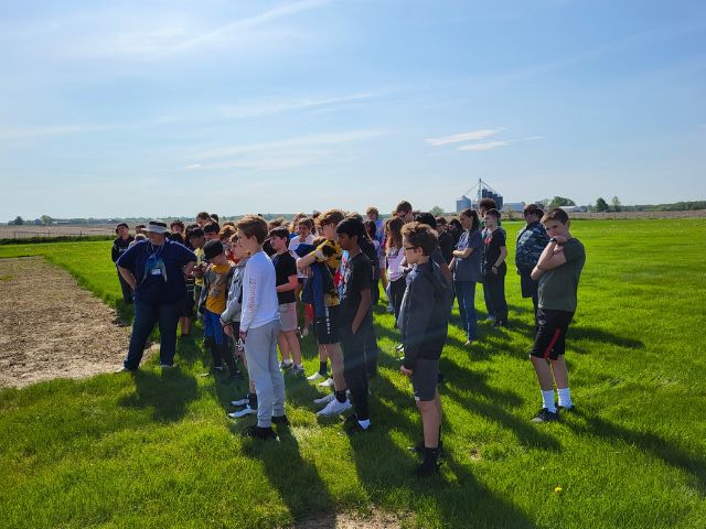 Students from Quad Cities Iowa visit a prairie restoration site during a Greening STEM project in prairie 