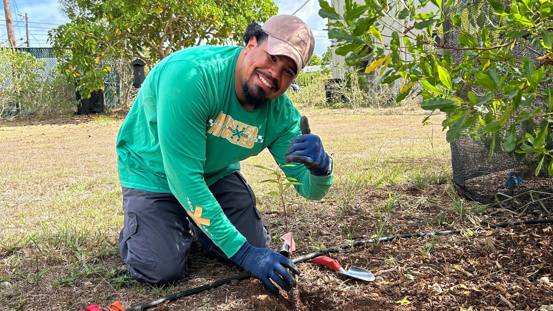 a Department of Defense employee participates in a volunteer planting project on National Public Lands Day