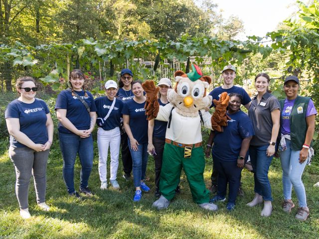 NEEF staff with Woodsy the Owl at NPLD 2024 signature site