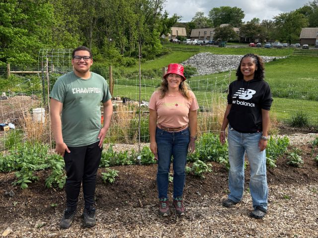 McCaskey High School students stand in the school garden