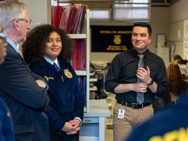 Greening STEM grantees Valerie Gray and Brandon Bixler speak with PA Agricultural Secretary Redding