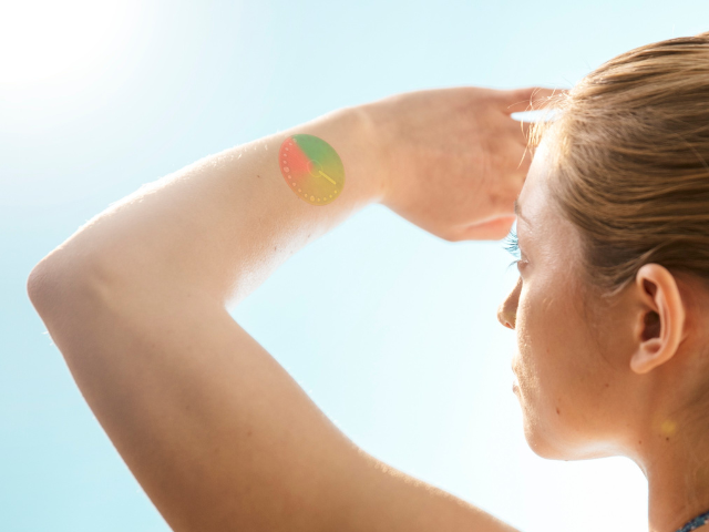 Woman looking directly at sun