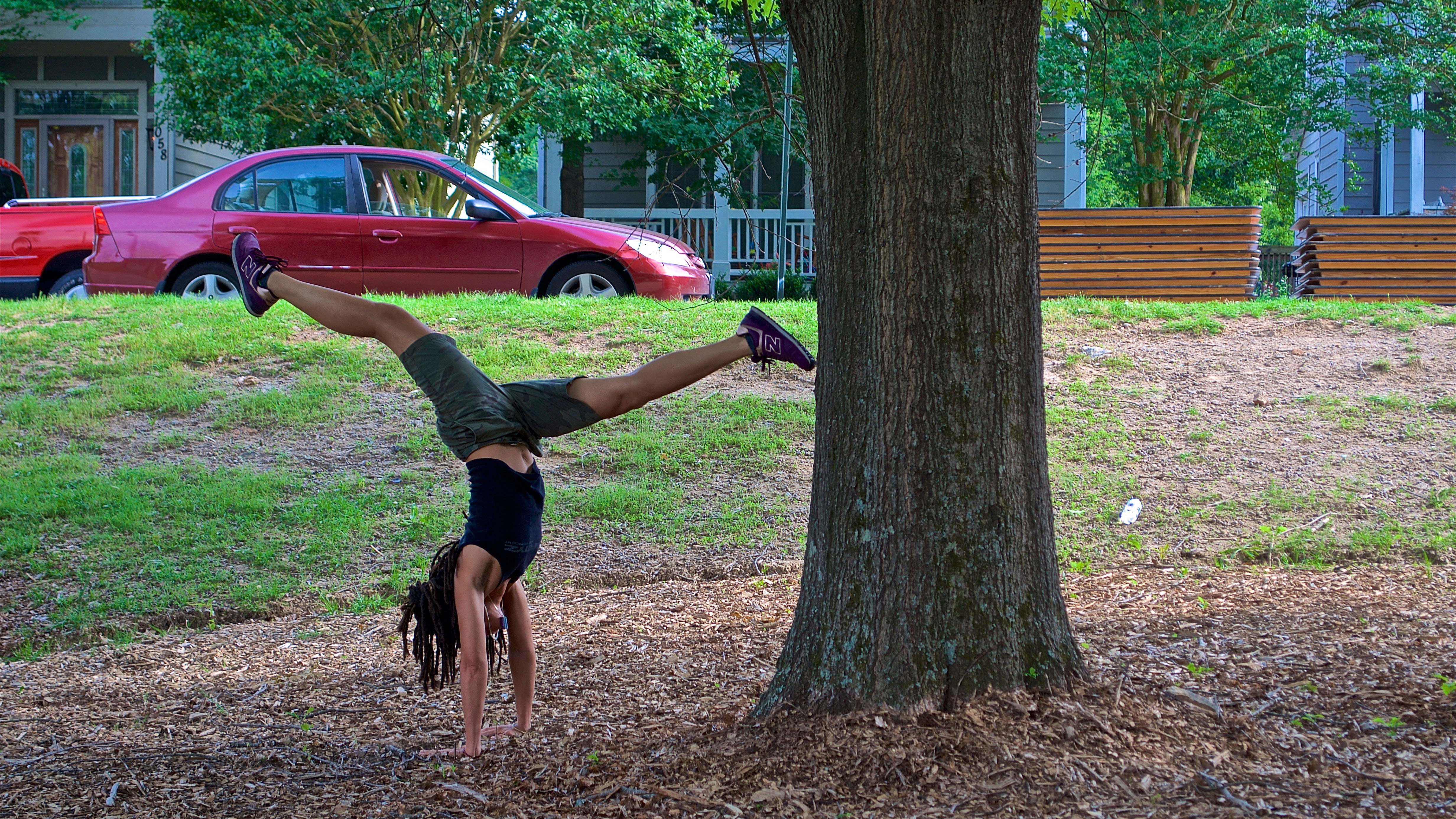 Gymnastics under a tree at the Atlanta Beltline
