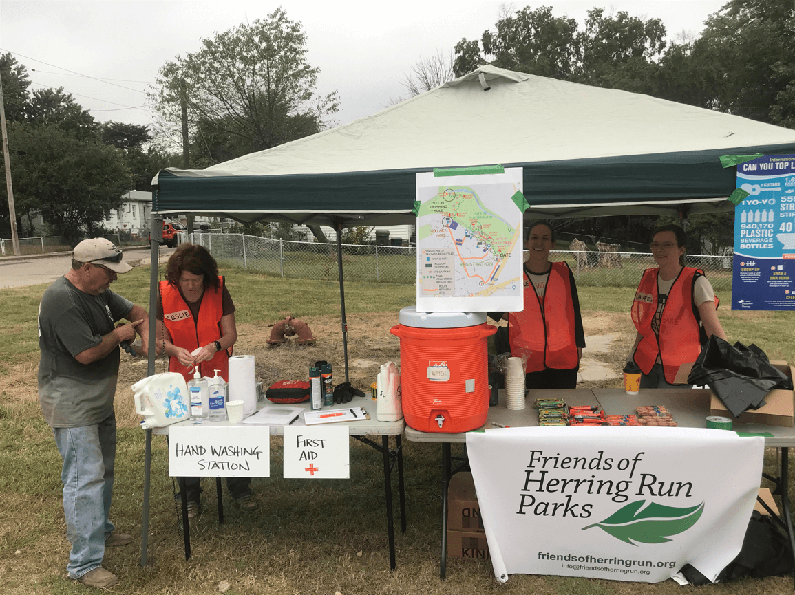 Volunteers working the welcome tent and safety station at the NPLD event.