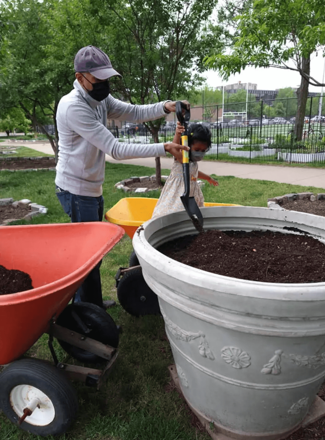 Volunteers prepping planters used for Love Garden