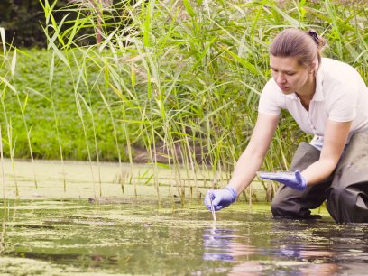 Ecologist at a riverbank