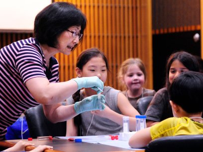 Huei Chen teaching children