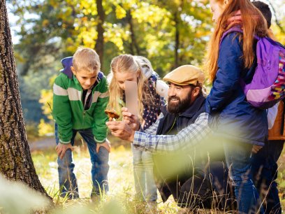 Teacher with kids at an outdoor classroom