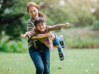 Parent and child playing outside