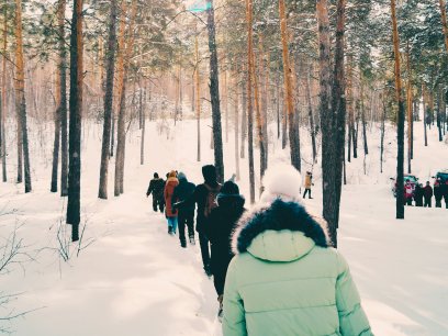 Researchers walking through the snow