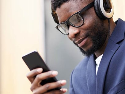 Young man listening to headphones