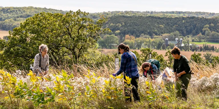 Photo of women restoring prairie on public lands