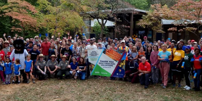 large group of people posing for a group picture after a National Public Lands Day event