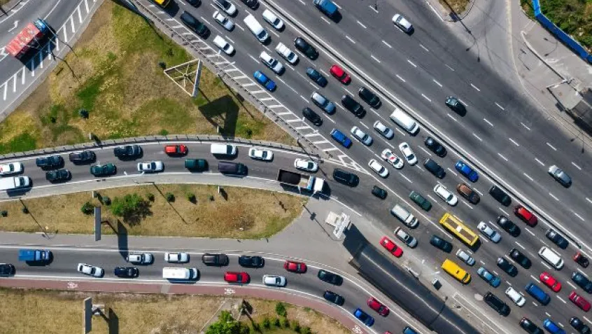 aerial view of a busy highway with a traffic jam during the holidays