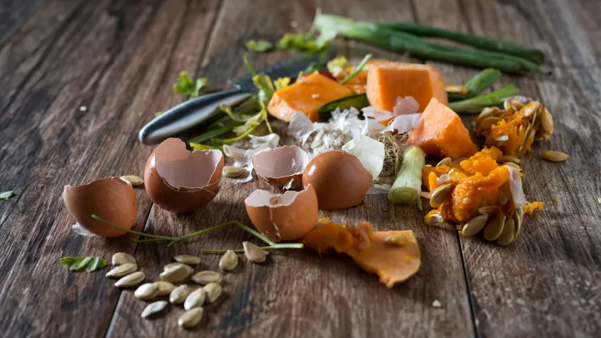 Food scraps on a cutting board