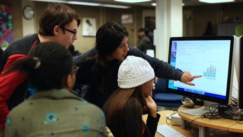 Teens at a computer