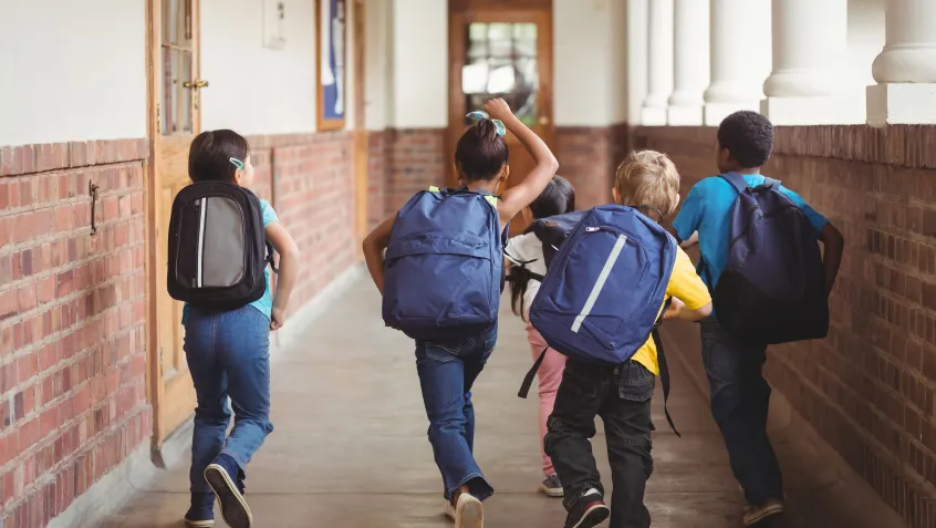 Children running to class