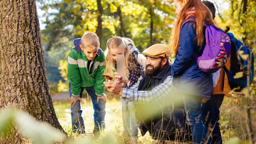 Teacher with kids at an outdoor classroom