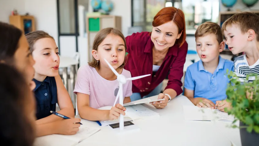 Teacher and students doing an environmental lesson