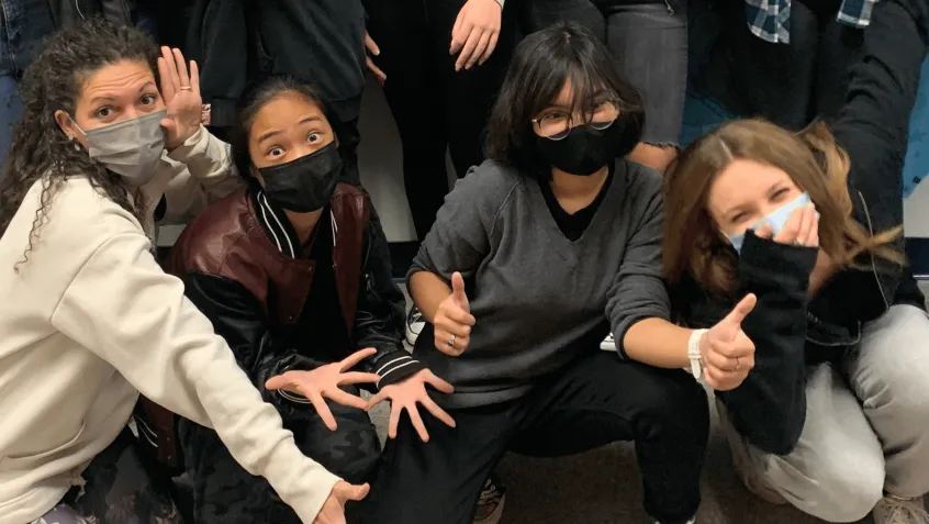 Teacher Samantha Barry celebrates with her students