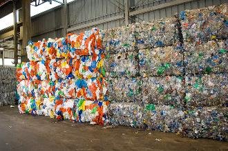 Bales of plastic waste at a recycling facility