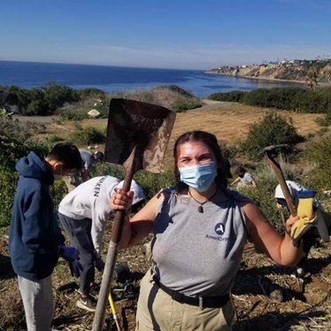 AmeriCorps team member installing native plants at Abalone Cove Reserve