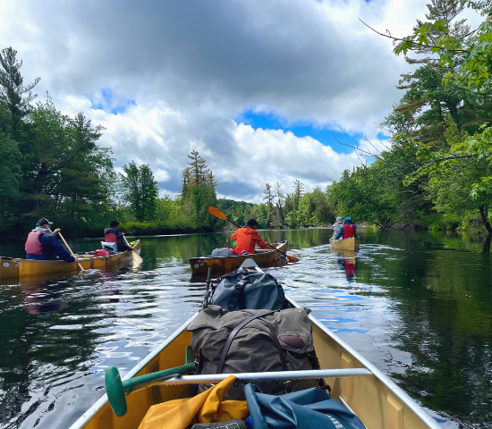 Canoe on the river with others