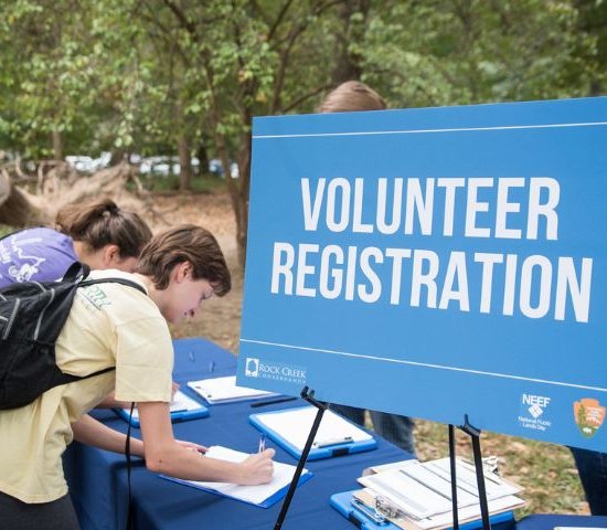 a volunteer registers for an outdoor volunteering event