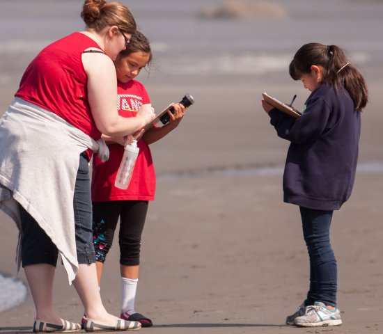 Greening STEM kids collecting data at the shore