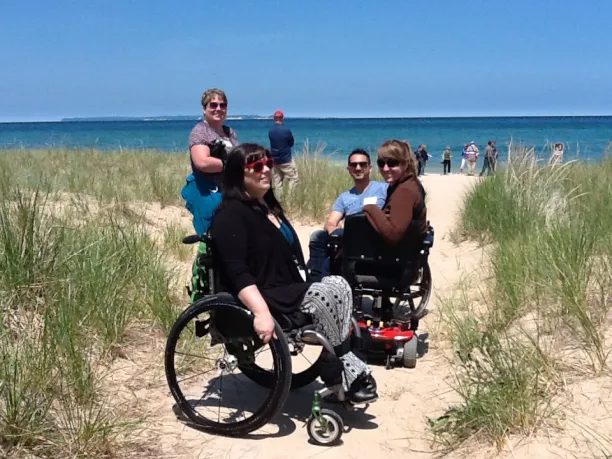 A group of people near the beach