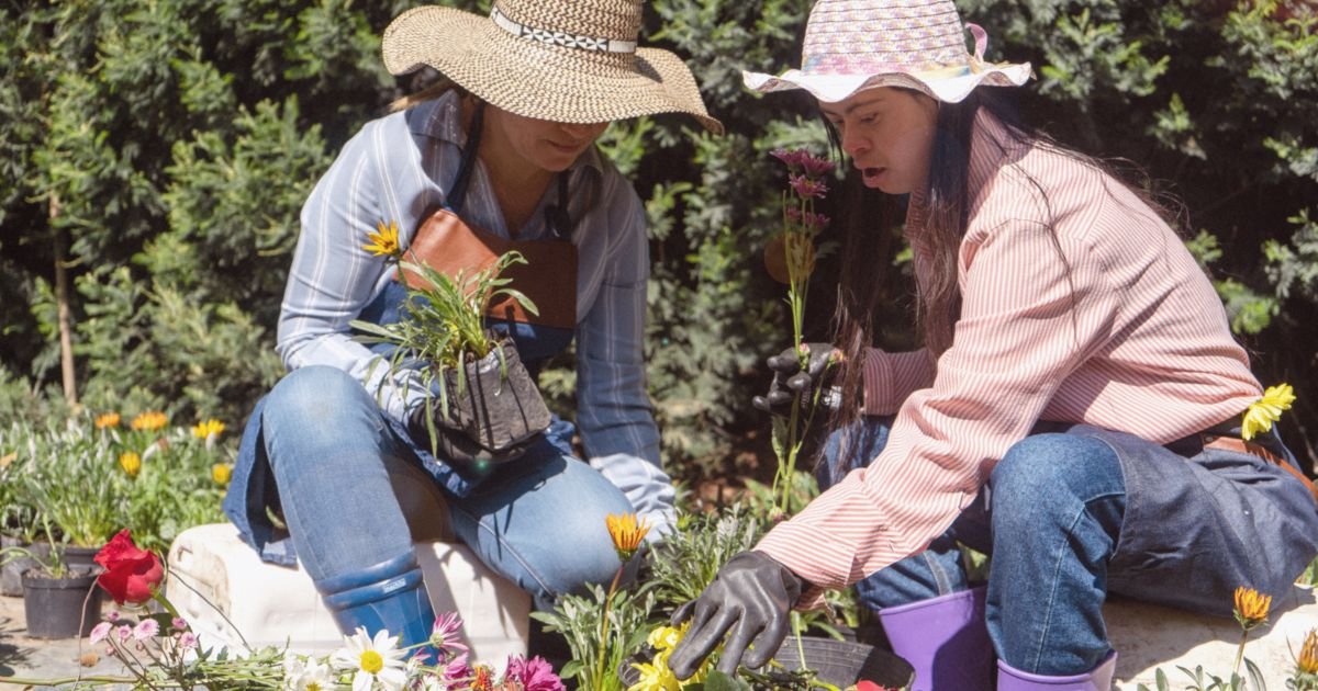two women getting their spring garden ready during Earth Month