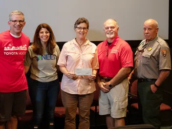 NEEF, Toyota, and Big Thicket representative receiving check