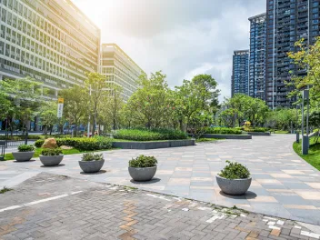 Green space surrounded by tall buildings