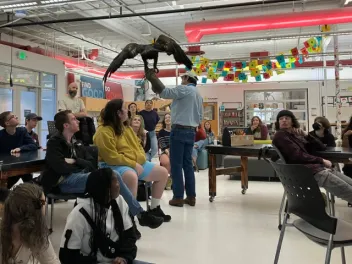 a raptor demonstration in a school classroom