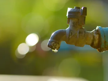 Wasting water in a drought, dripping faucet