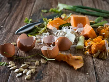 Food scraps on a cutting board