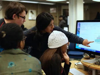 Teens at a computer