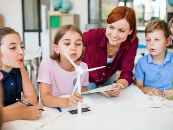 Teacher and students doing an environmental lesson